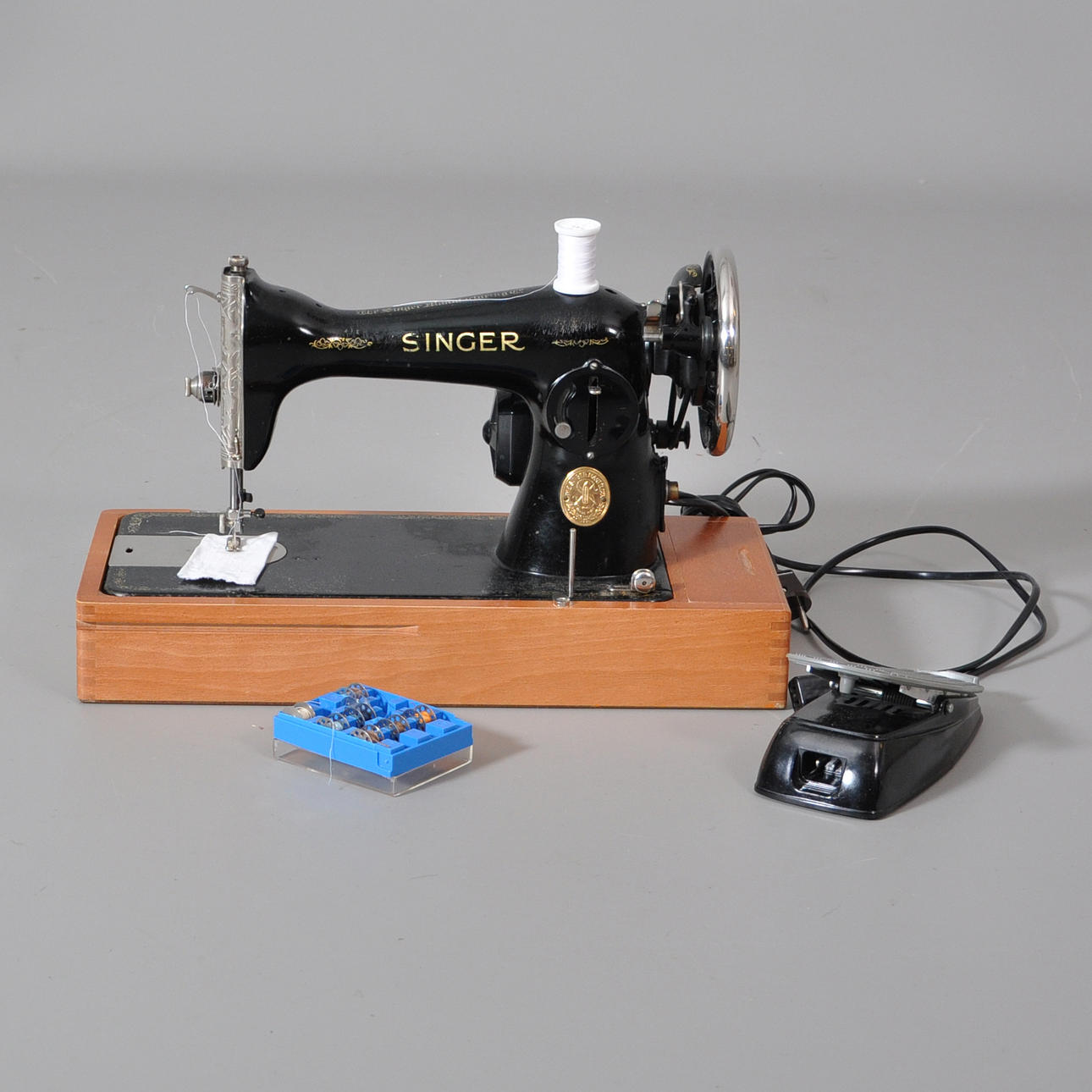 SYMASKIN, singer elektrifierad.