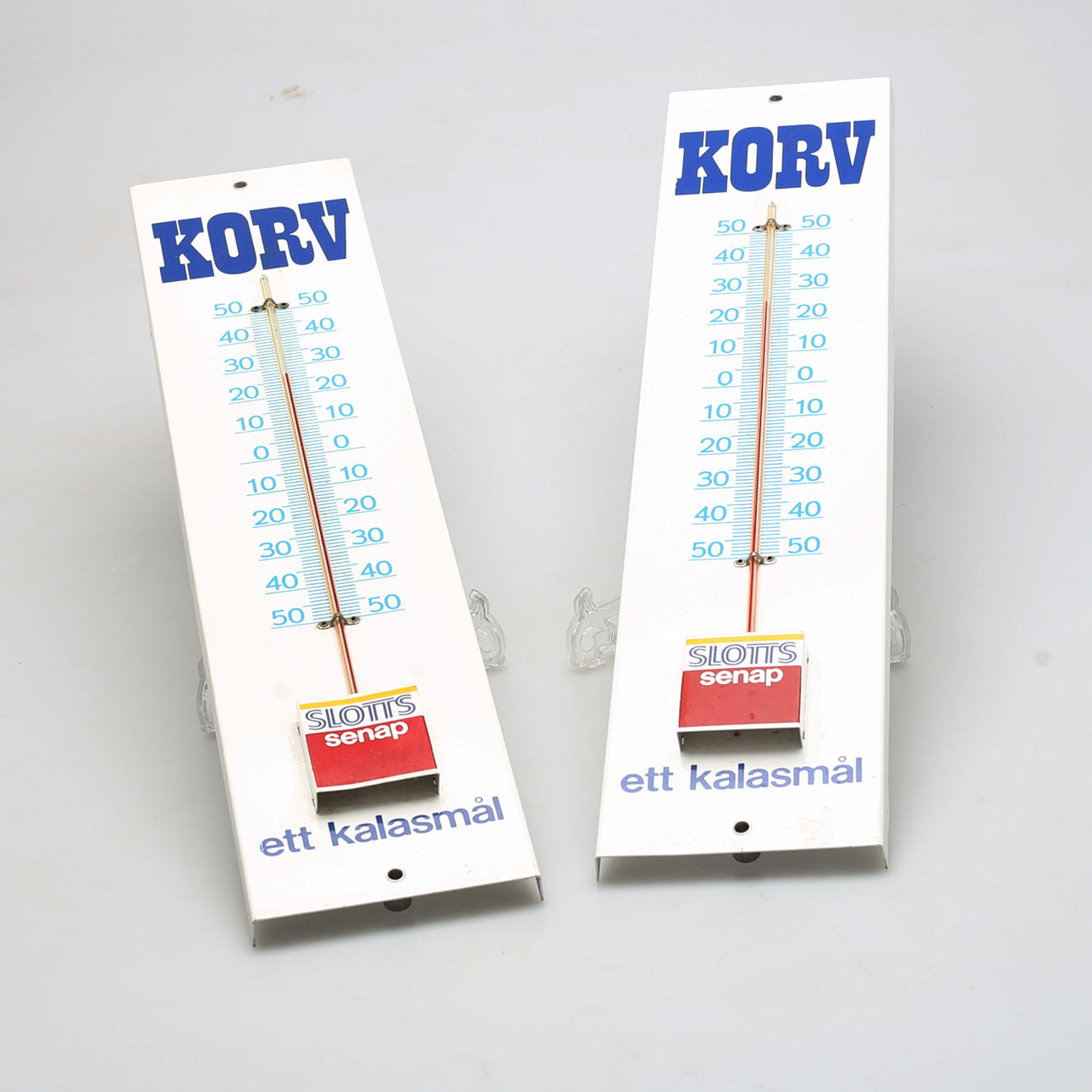 THERMOMETERS, two pieces, "Slotts senap", 1900s.