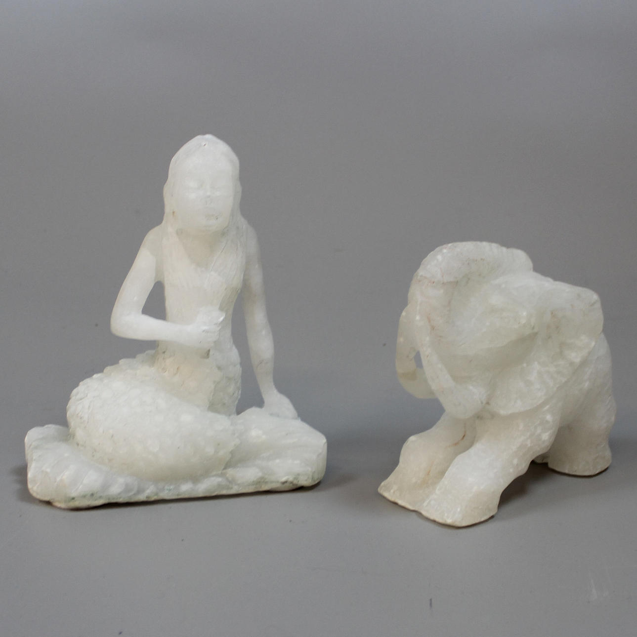 SKULPTURER 2 st mjölkkvarts.