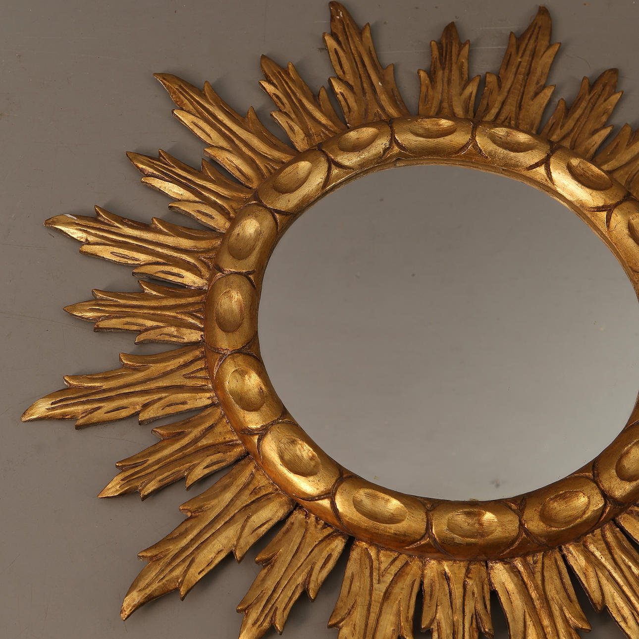 SUN MIRROR, wood, 20th century.