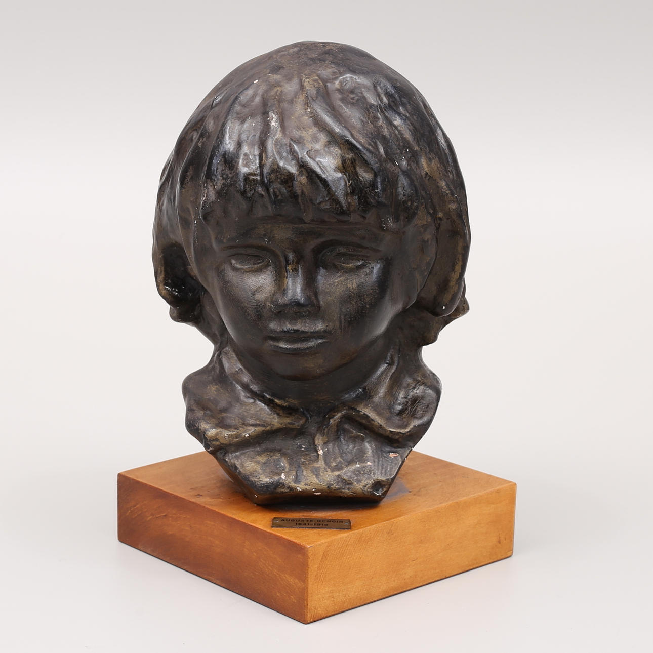 AUGUSTE RENOIR. Danach "Coco", Bronze patinierter Putz.