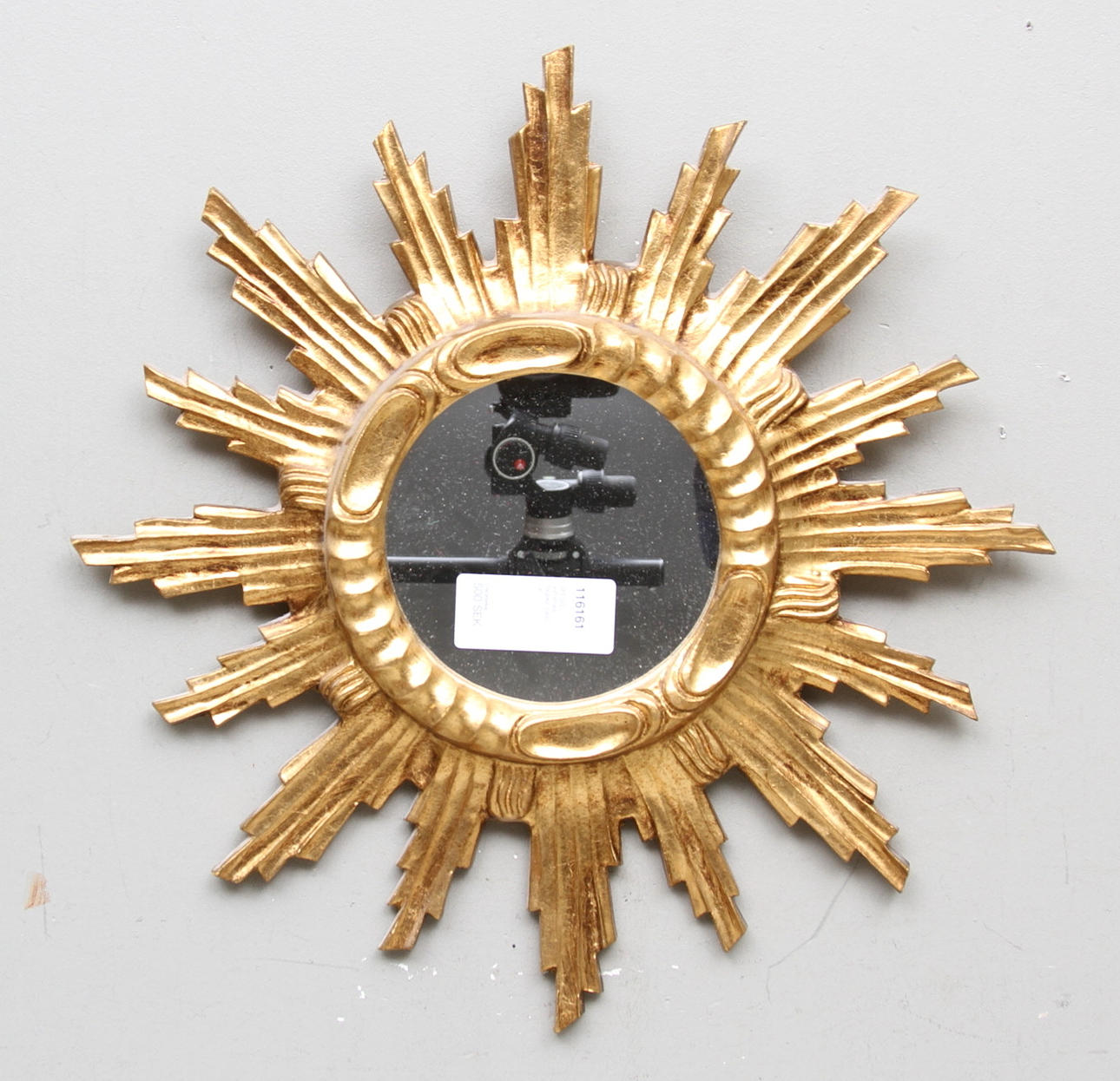 SPEGEL, solformad, förgylld. 1900-tal.