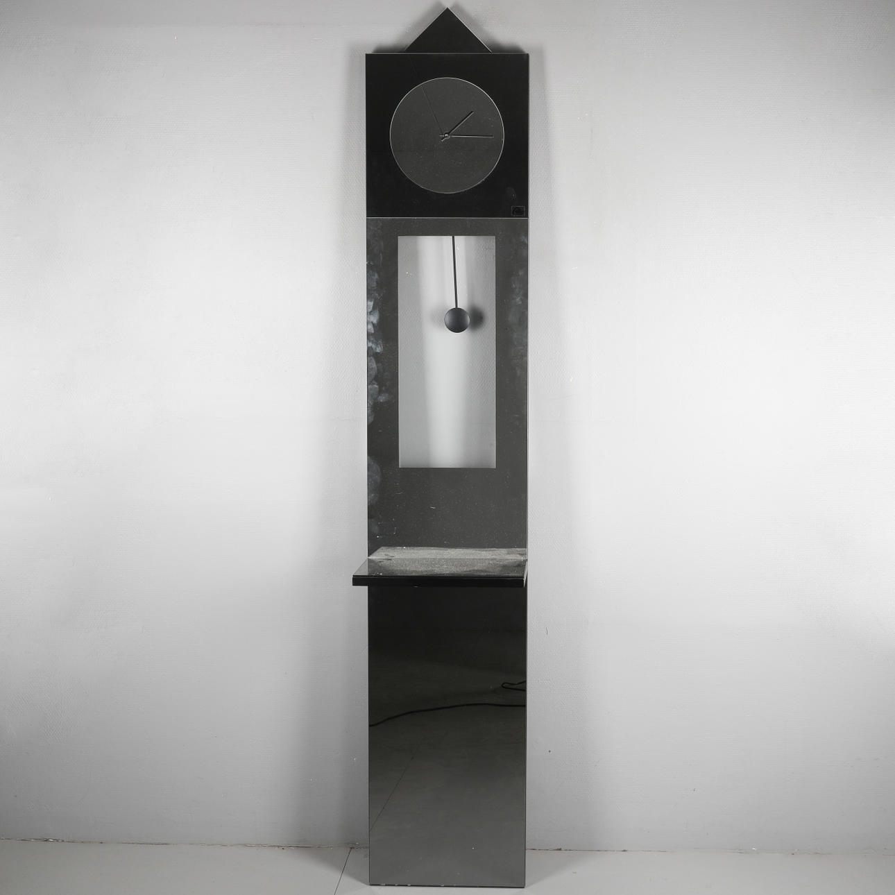 SPEGEL/KLOCKA, 1900-tal.