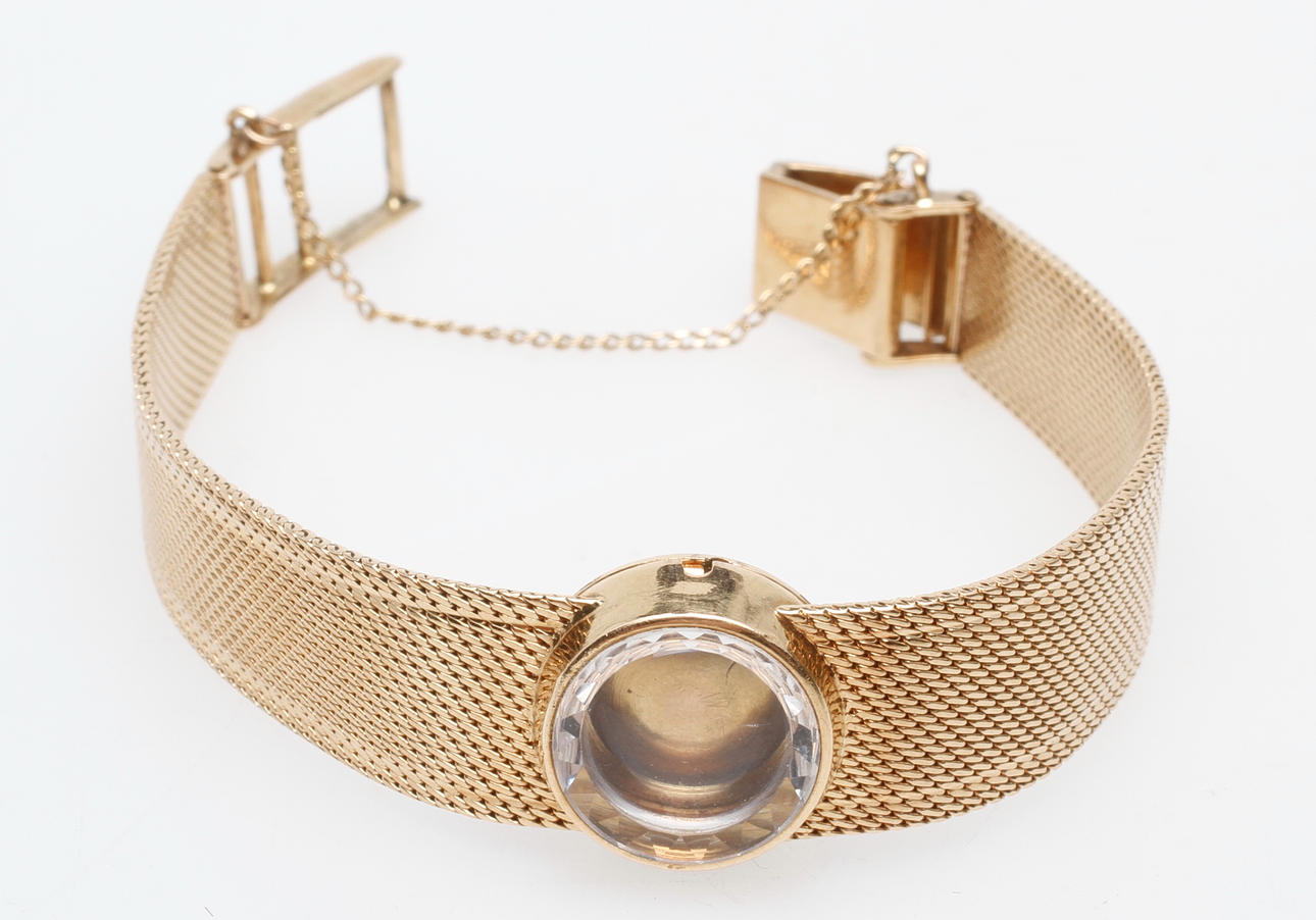 ARMBANDSUR (UTAN URVERK) MED ARMBAND, 18k guld, total vikt ca 30.8 gr.