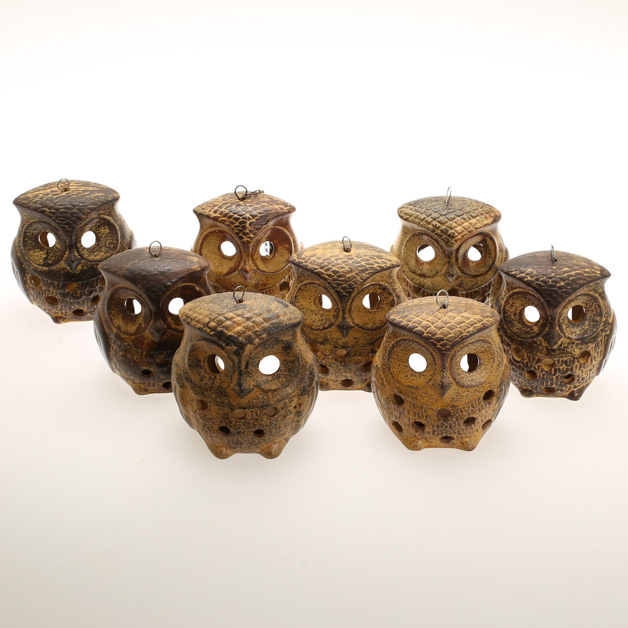 LJUSLYKTOR, 8 stycken, "Uggla", keramik.