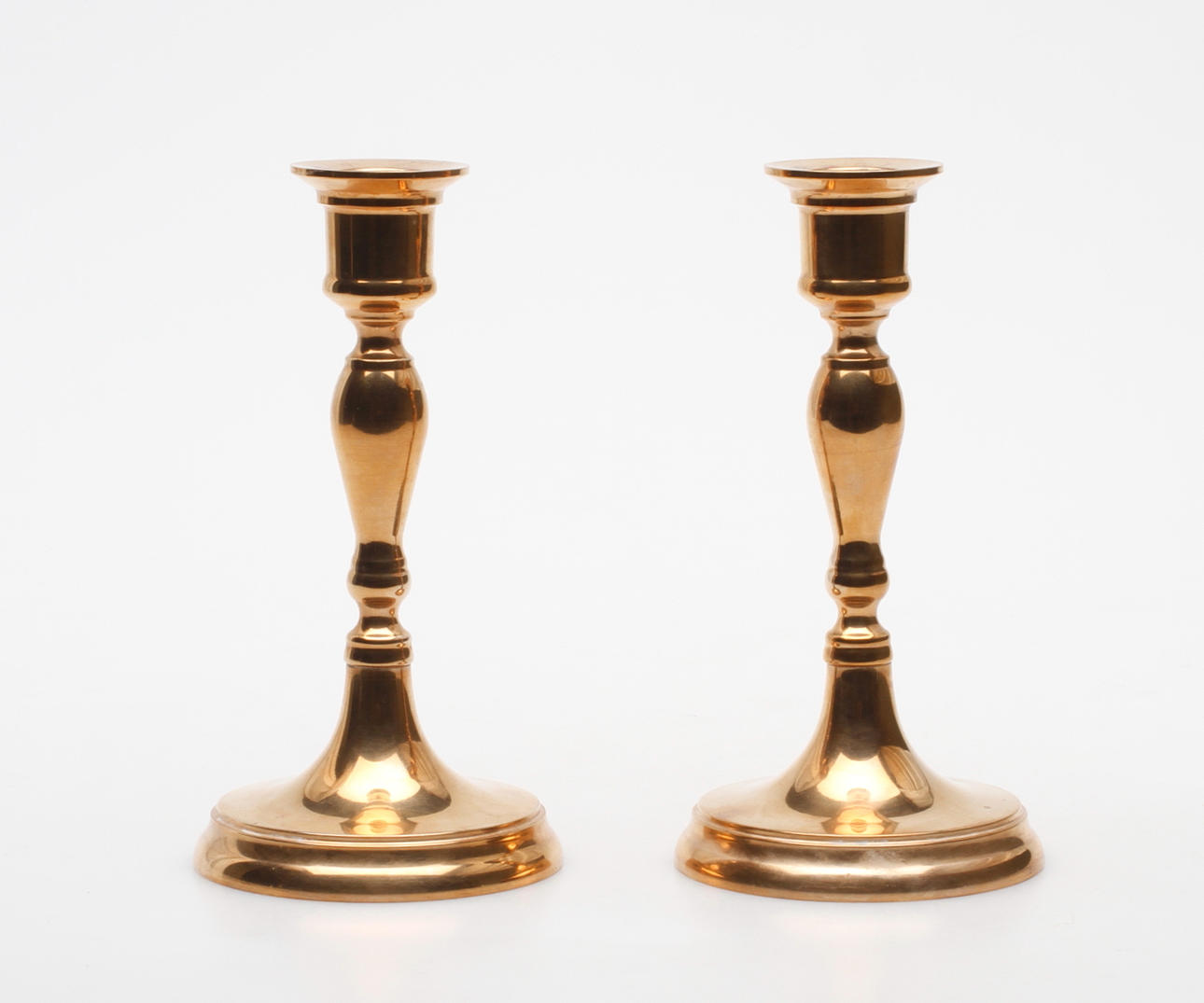 LJUSSTAKAR, ett par, malm, Bersbo, 1993 Katarina.