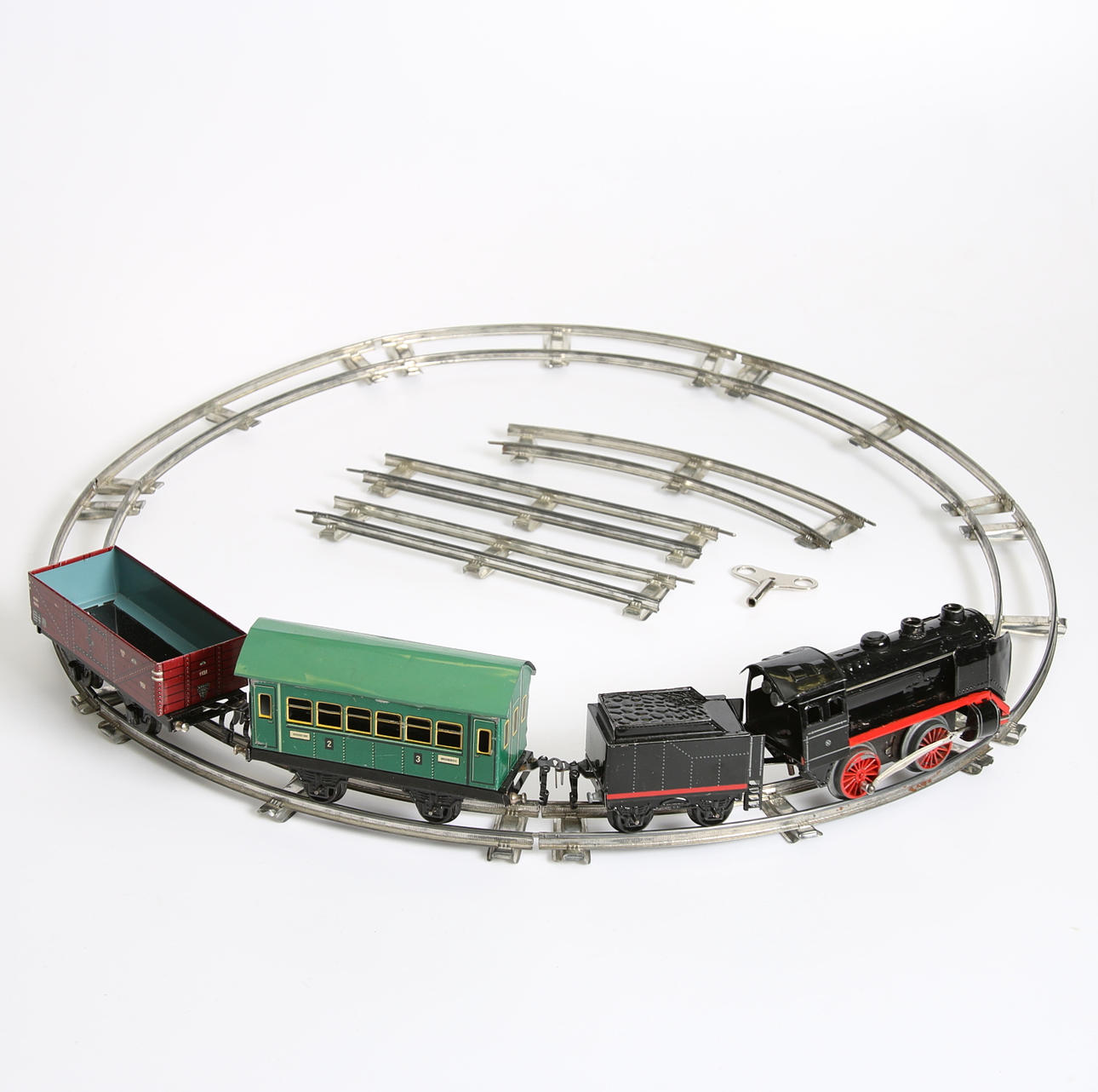 TÅGBANA, tåg och bandelar, troligen märklin, 1900-tal.