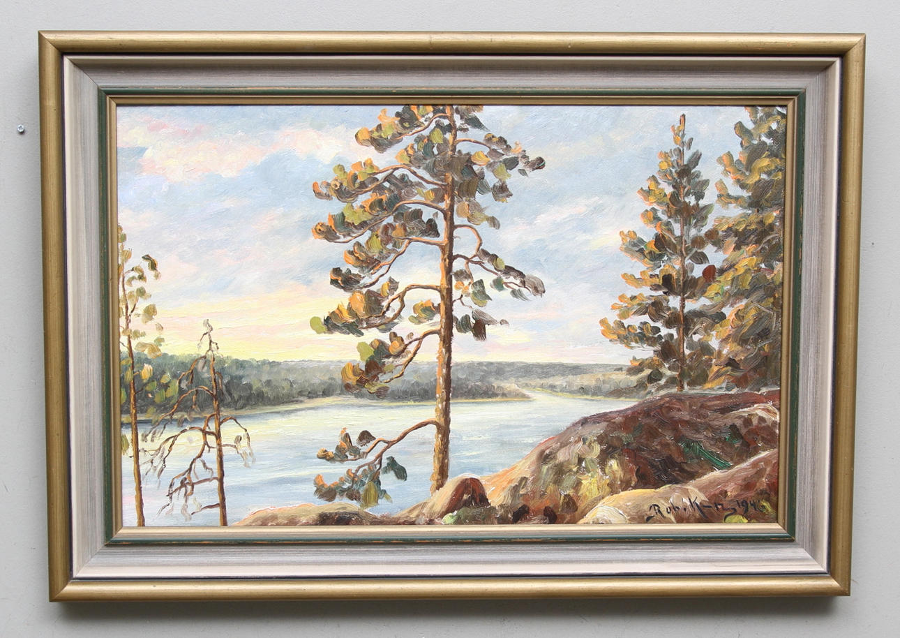 ROBERTH KARLSSON. Solbelyst berghäll med tallar. Olja på pannå. Signerad och daterad 1946.