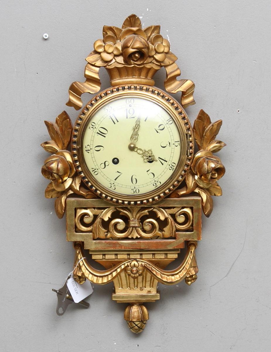 VÄGGUR, sk guldpendyl.