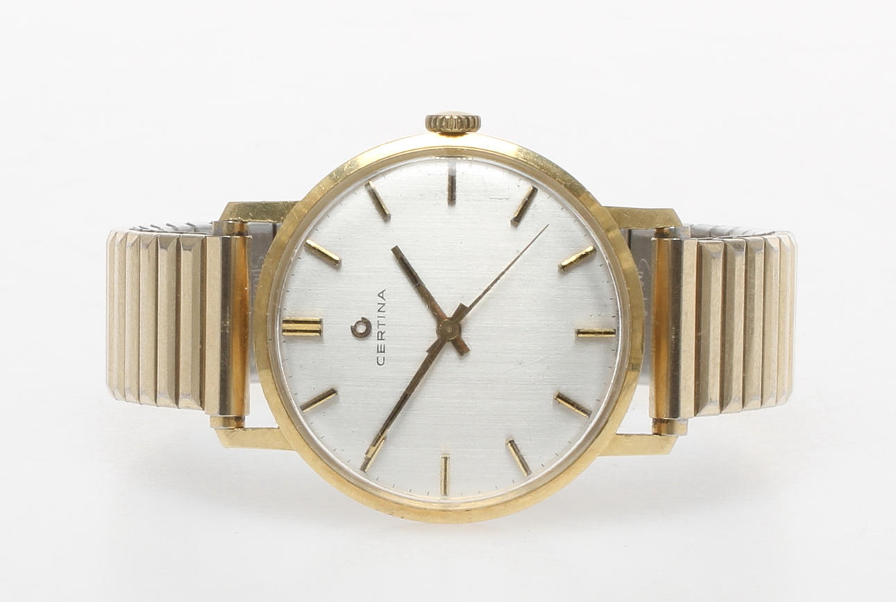 HERRARMBANDSUR, Certina, boett i 18k guld.