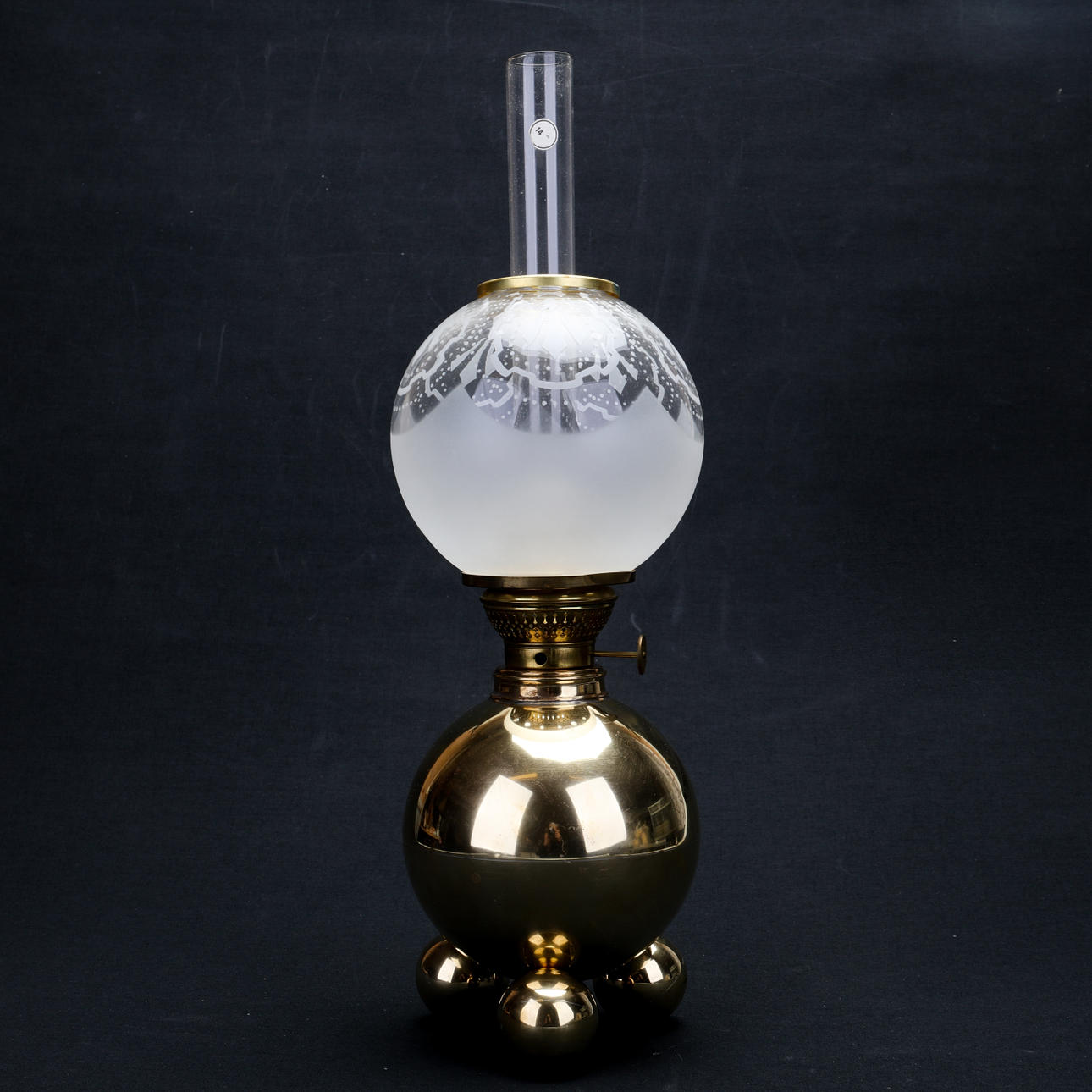 TORSTEN TRYCKARE. table kerosene lamp, brass, ball model, 1986.