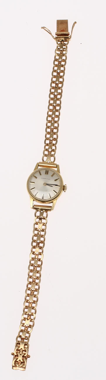 DAMARMBANDSUR, Certina, med bismarcklänk, 18k guld. Total vikt inklusive verk 18 g.