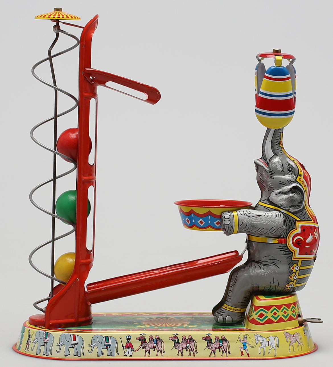 Cirkuselenfant i litograferad bleckplåt. Made in Germany US Zone.