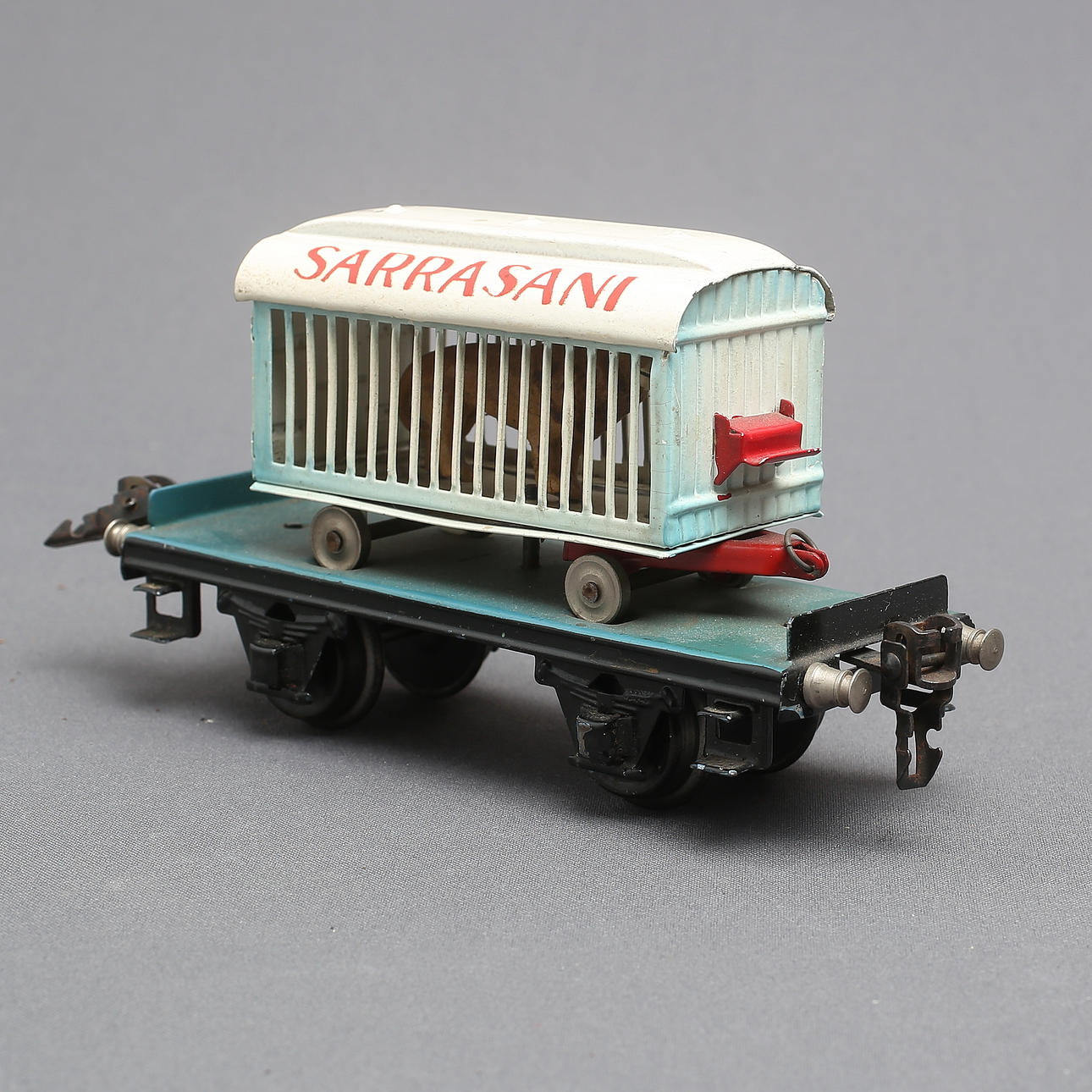 MÄRKLIN 1983 platform wagon with SARRASANI circus cage with lion, track 0.
