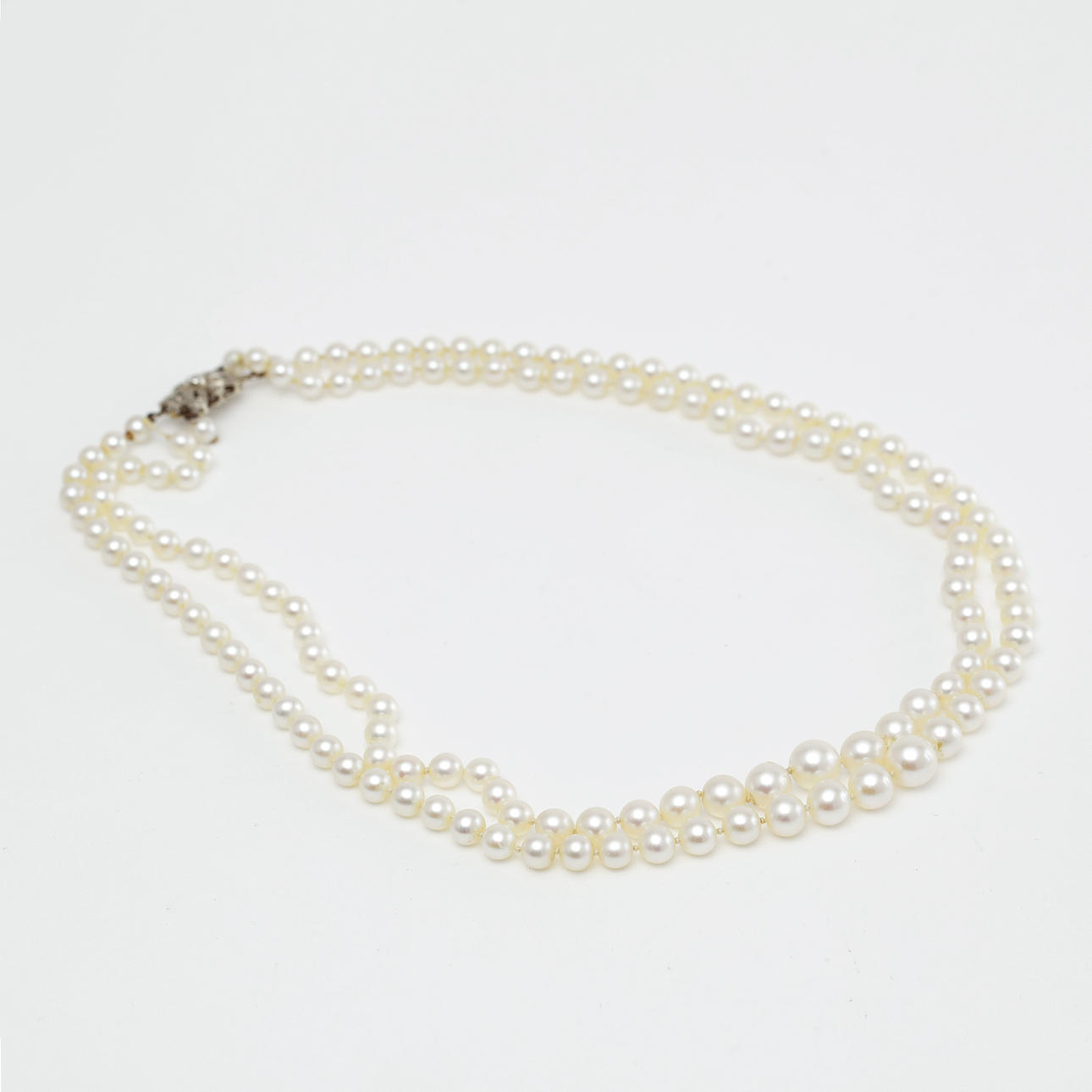 PÄRLCOLLIER, vitguldslås med diamant.