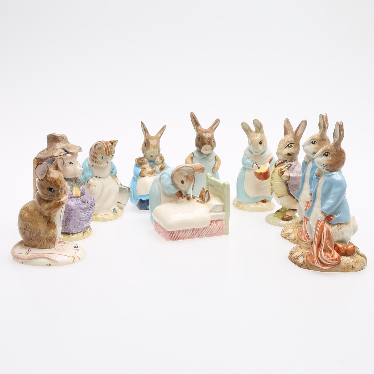 FIGURER, TIO STYCKEN, efter Beatrix Potter, glaserat.
