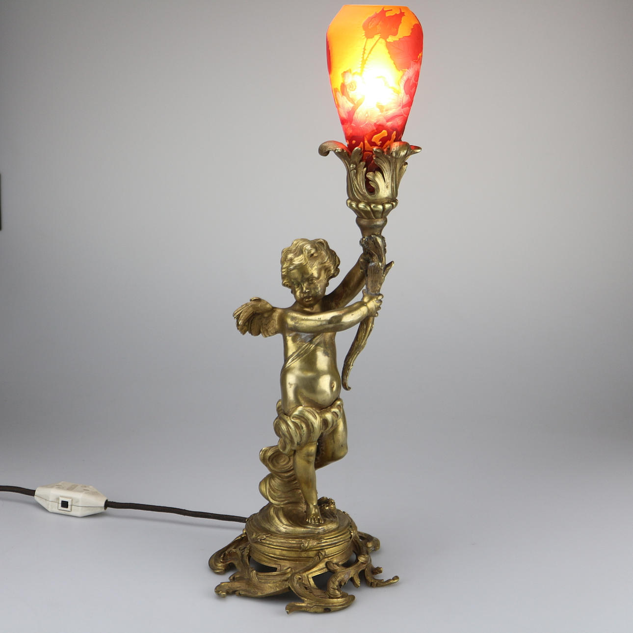 CHERUB LAMP WITH GALLÉ SHADE.
