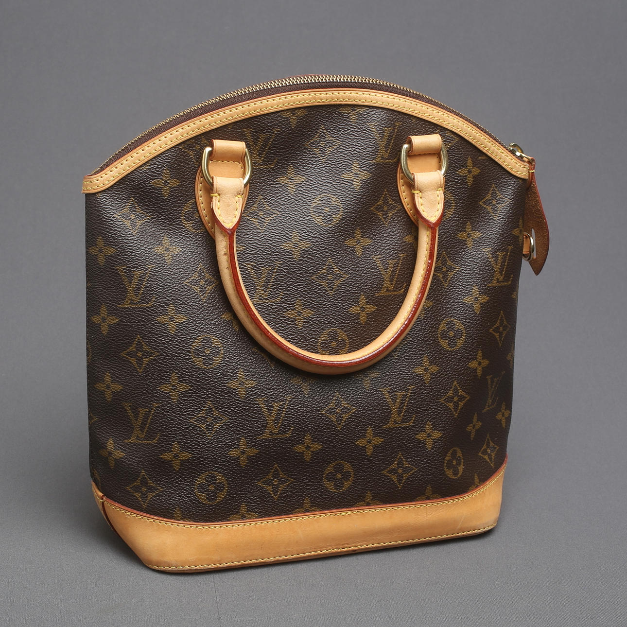 LOUIS VUITTON. Handtasche, "Monogram Lockit Vertical", Frankreich 2006.