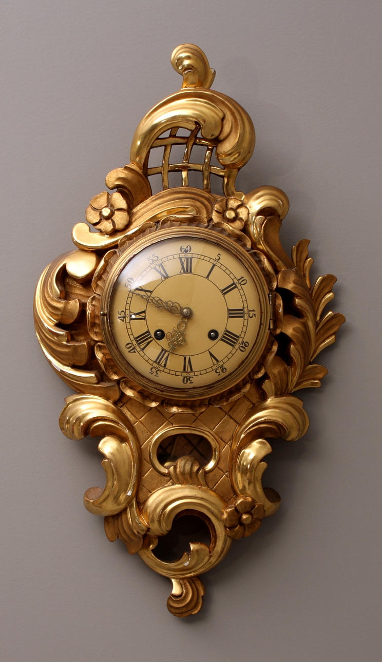 WALL Clock rococo style, woodcut, gilded.
