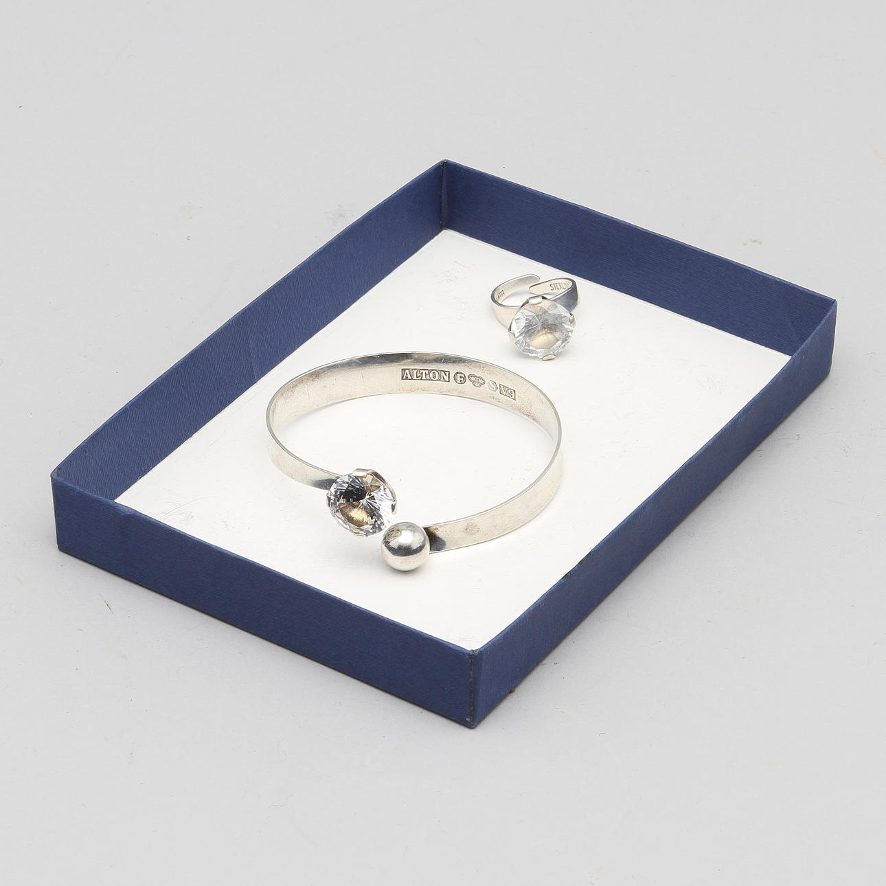 ARMSMYCKE OCH RING, silver och bergskristall, Alton samt K-E Palmberg för Alton.