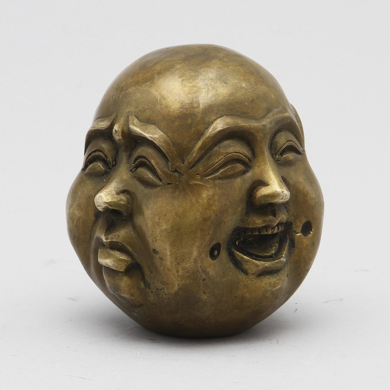 FIGURIN, Buddhas fyra ansikten, 1900-tal.