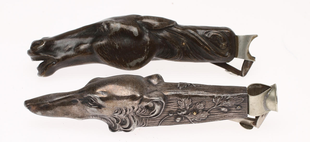 CIGARRSNOPPARE 2 st, i form av hästhuvud resp. vinthund, tidigt 1900-tal.