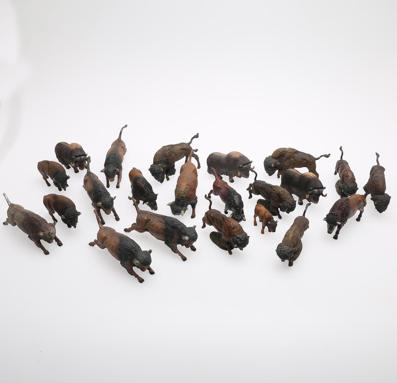 FIGURES IN THE SHAPE OF BUFFALO, BISON AND MUSCOX, 22 pcs. Germany and China, 1930s onwards.