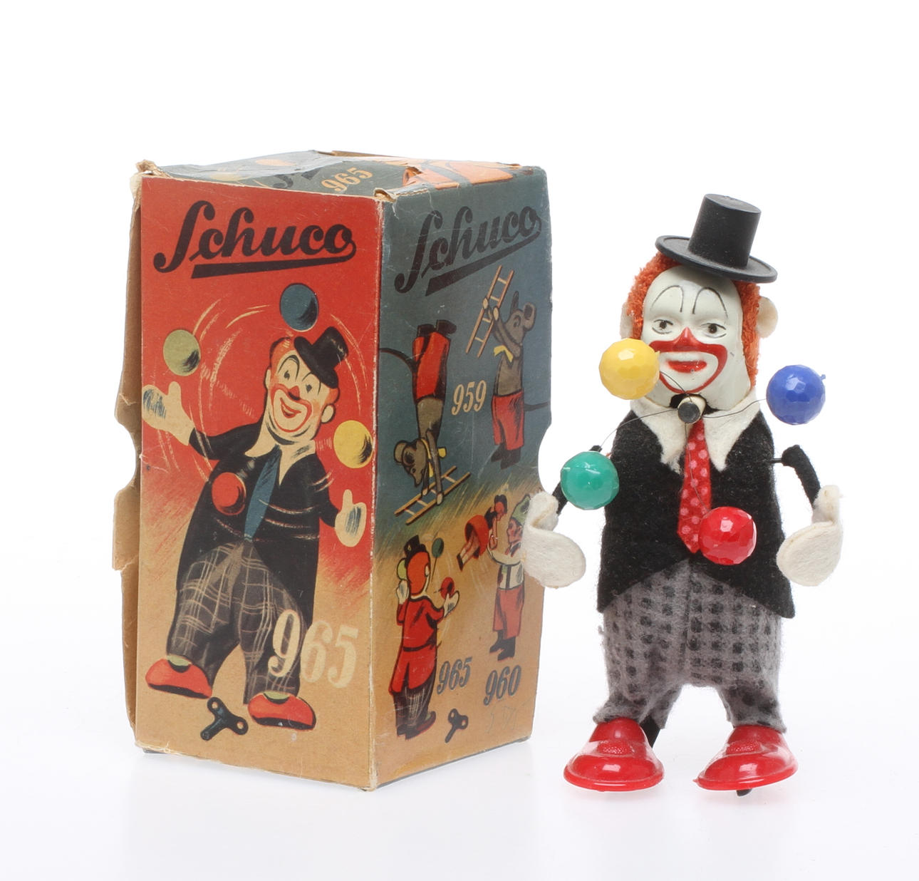SCHUCO jonglerande CLOWN i originalkartong. Urverk.