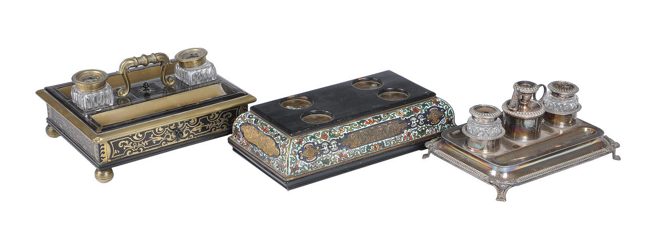 AN EBONY, BRASS INLAID AND MOUNTED STANDISH.