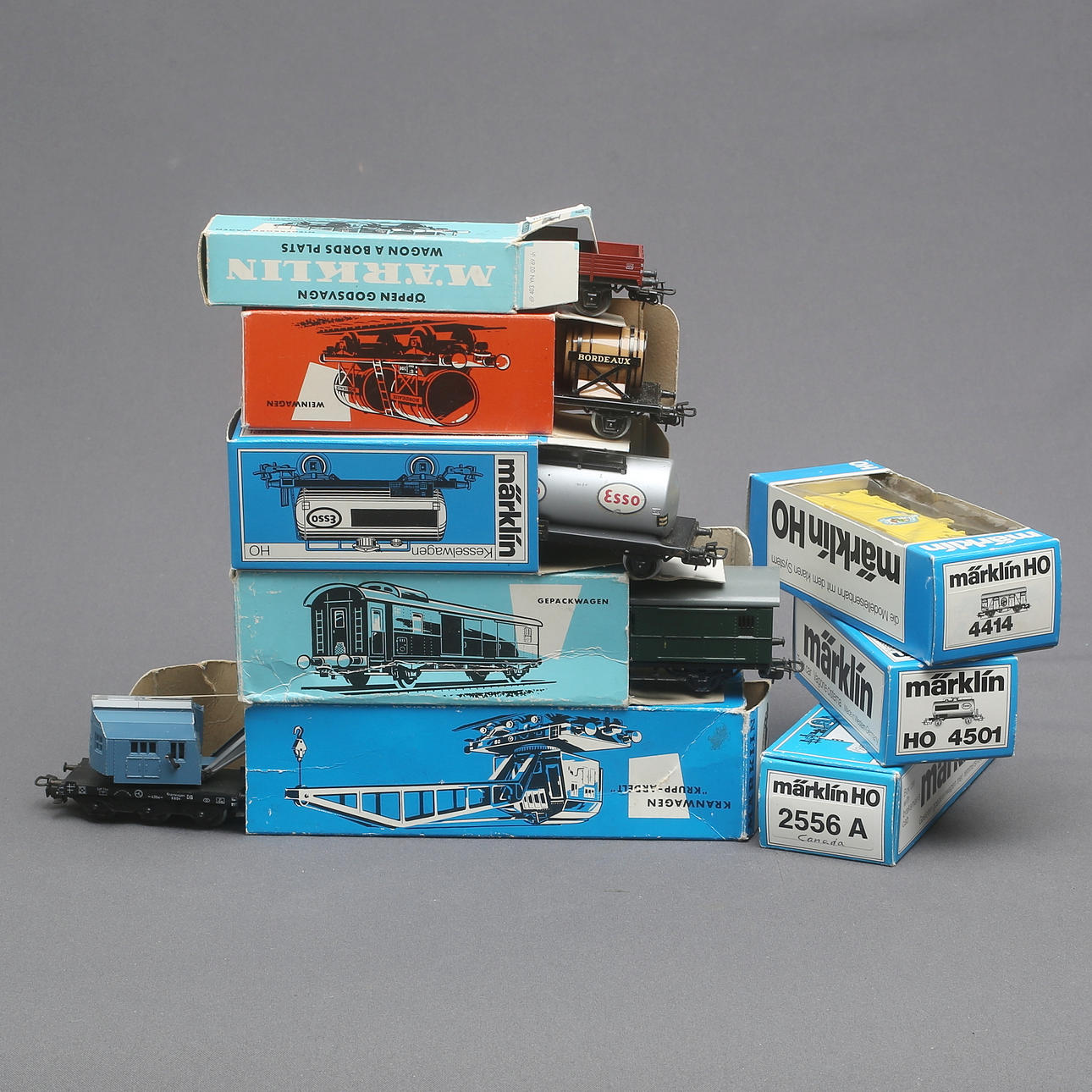 MÄRKLIN 7 wagons, 2-axle and crane wagon in original boxes. Toys ...