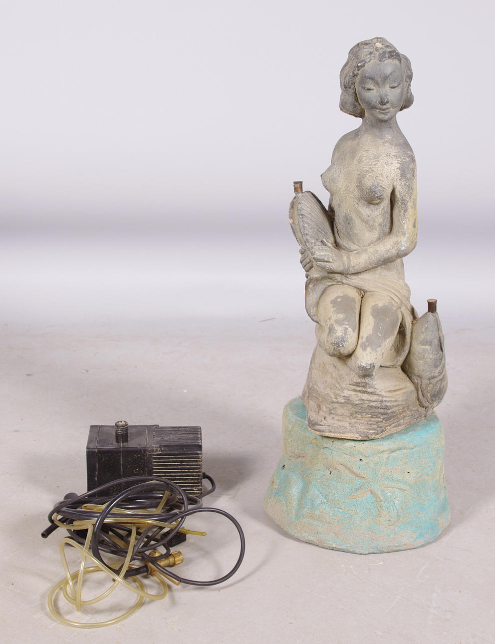 FONTÄNFIGUR med pump, C. Mansa.