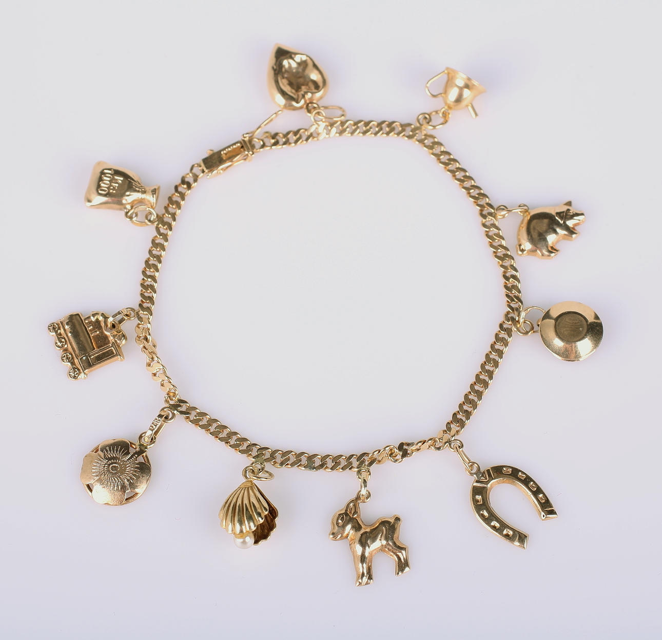 GULDARMBAND, 18K, med berlocke, vikt= 11 gram.