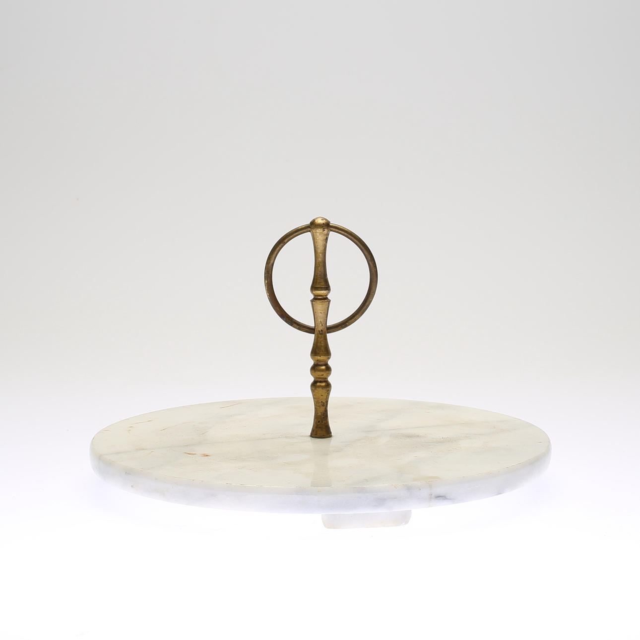 OSTBRICKA, mässing och marmor, 2000-tal.