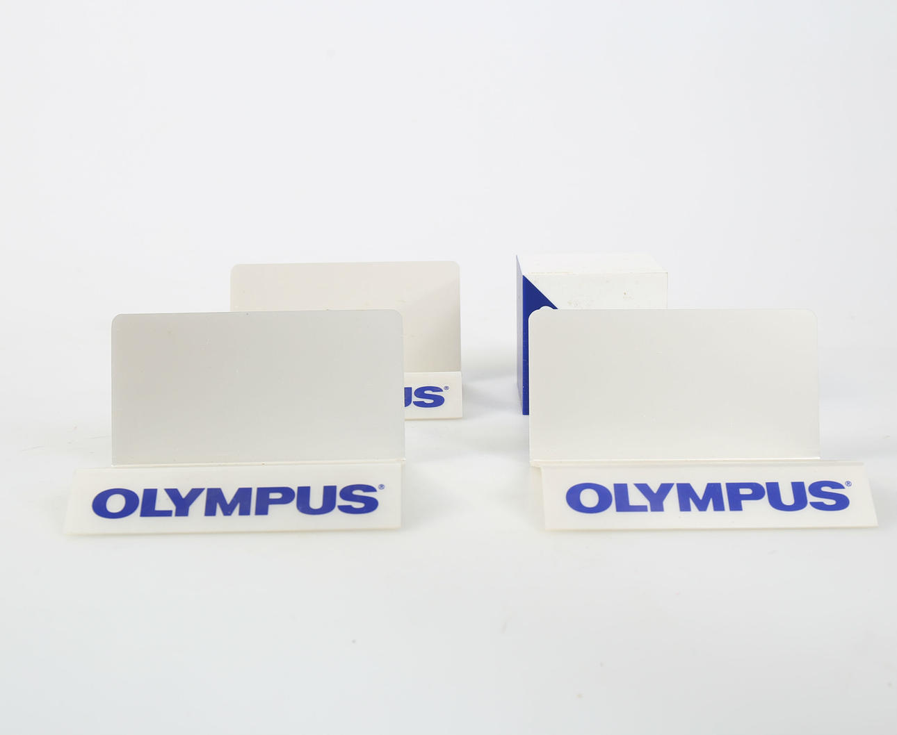 DISPLAY STAND, plastic, 4 pieces, Olympus.