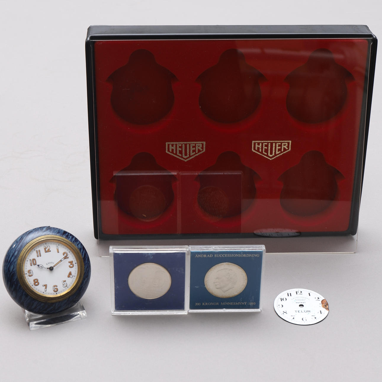 PARTI, bl.a. klocka, minnesmynt.