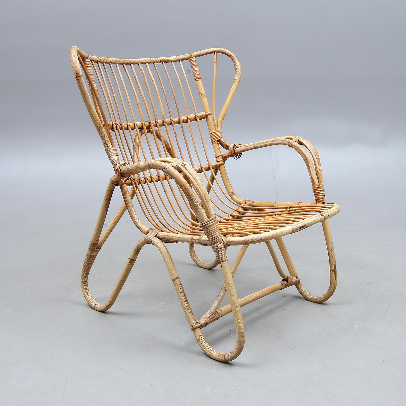 KORBSESSEL. Rattan, 20. Jahrhundert.