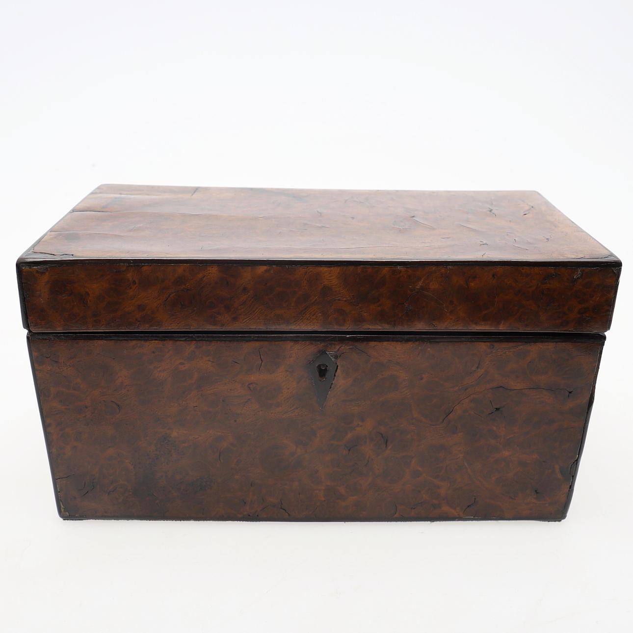 A GEORGE III BURR ELM RECTANGULAR TEA CADDY, CIRCA 1800.