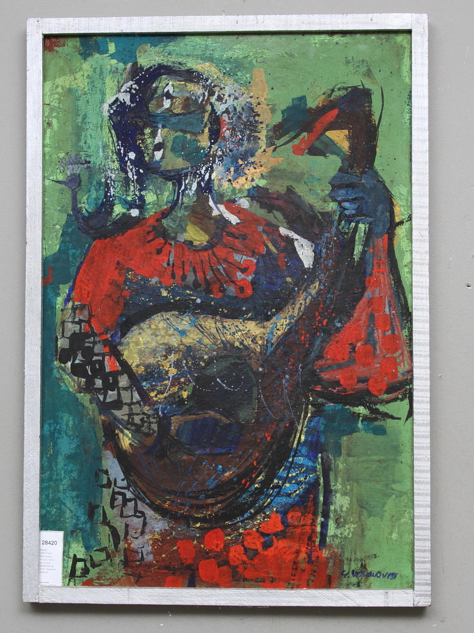 OKÄND KONSTNÄR. Gittarspelare mot grön fond. Olja på duk, uppklistrad på pannå. Signerad Wahlqvist.