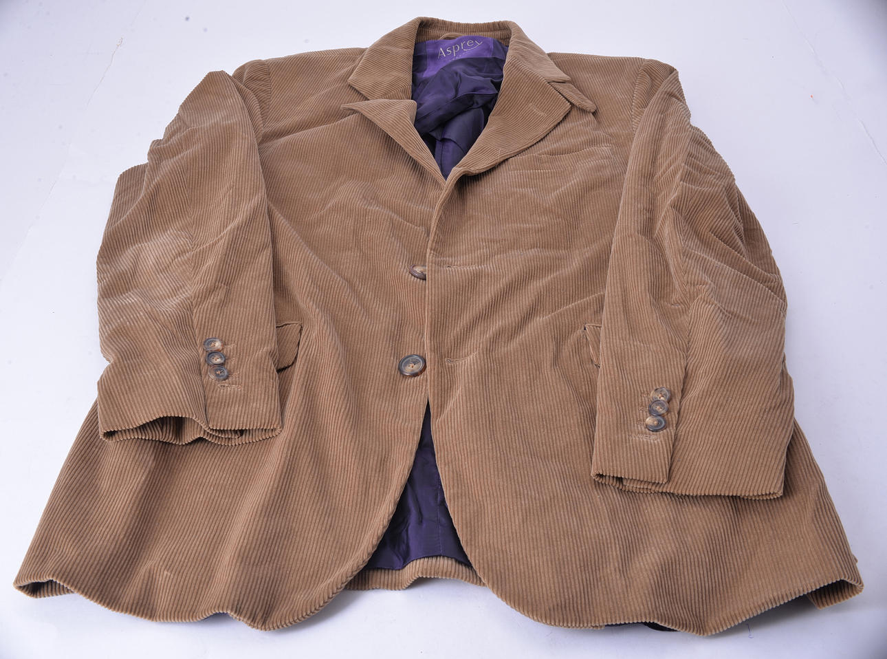 ASPREY, A BROWN CORDUROY JACKET.