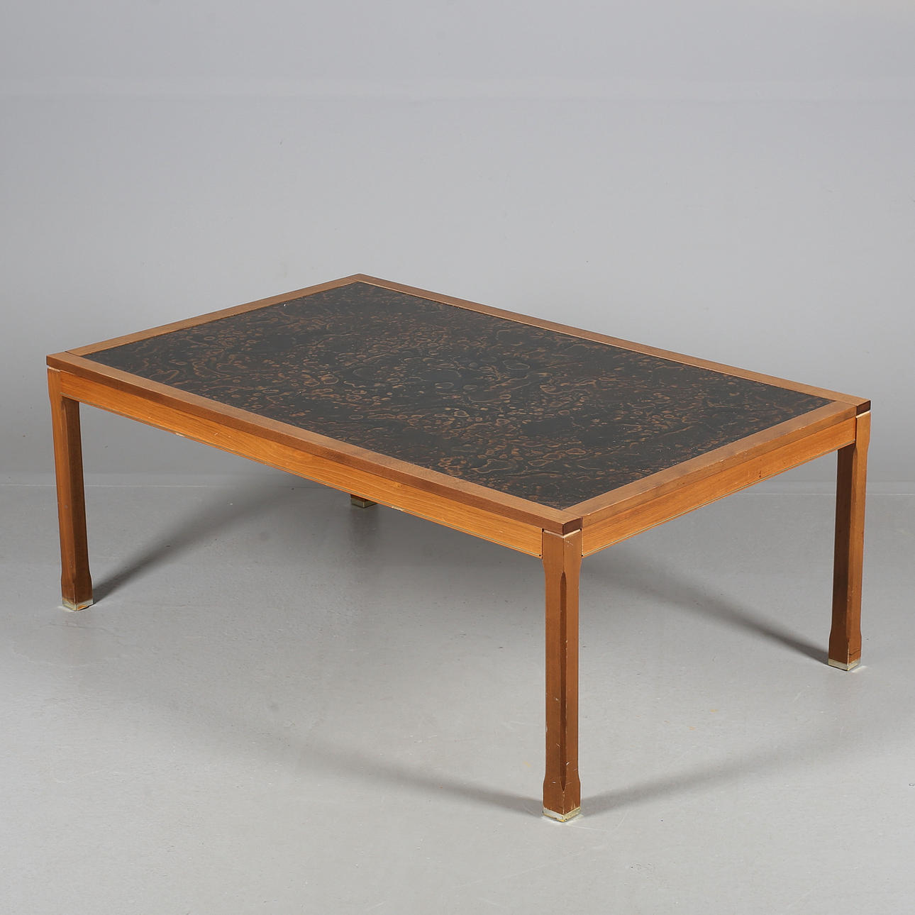 COFFEE TABLE, wood/composite/brass, 1970s.
