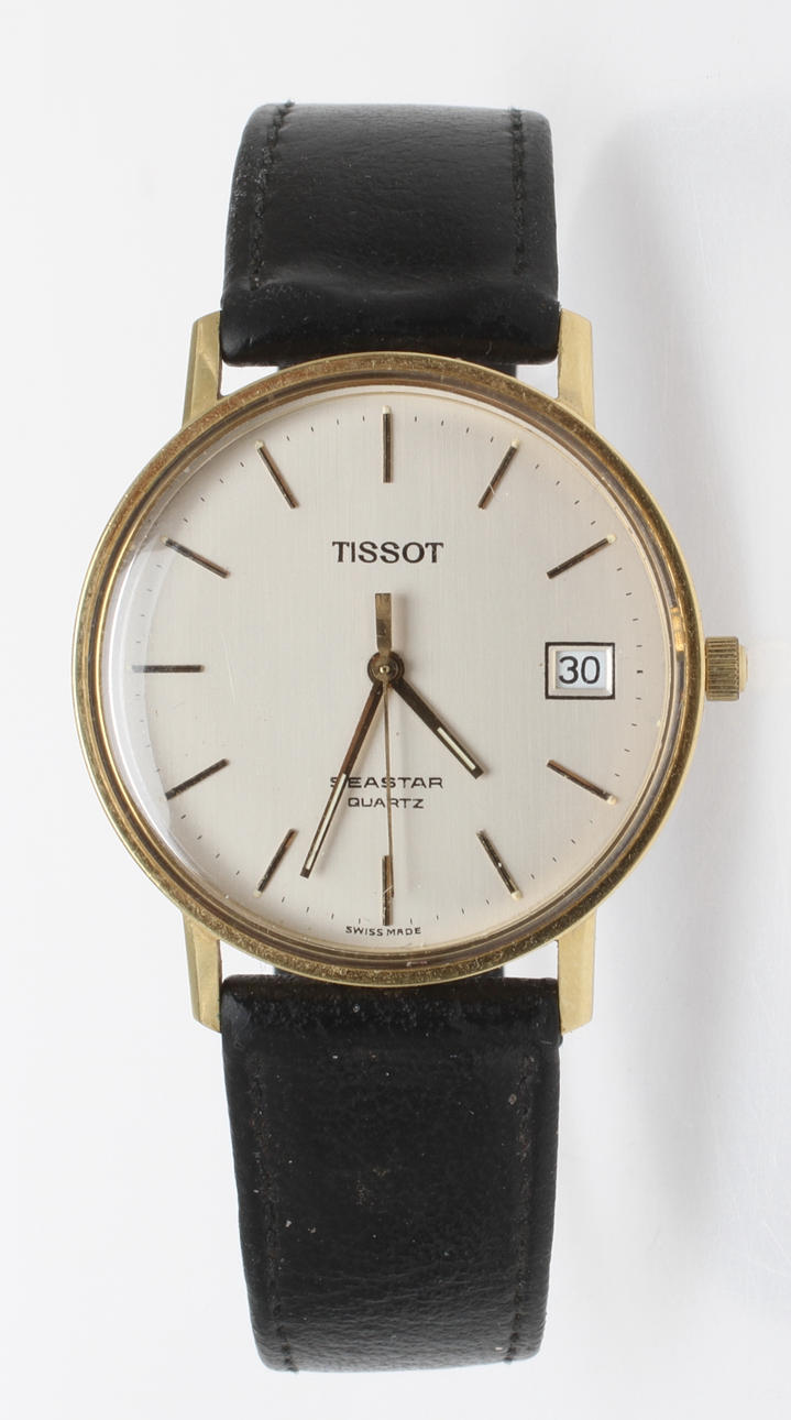 HERRARMBANDSUR. Tissot Seastar Quartz, 18 k guld.
