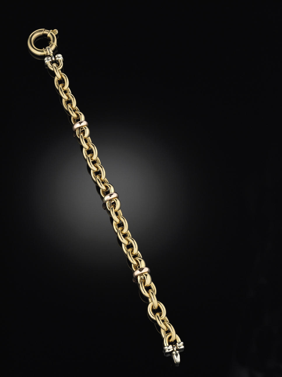 ARMBAND, 18 kt guld i tre färger, fantastimodell (slitage).