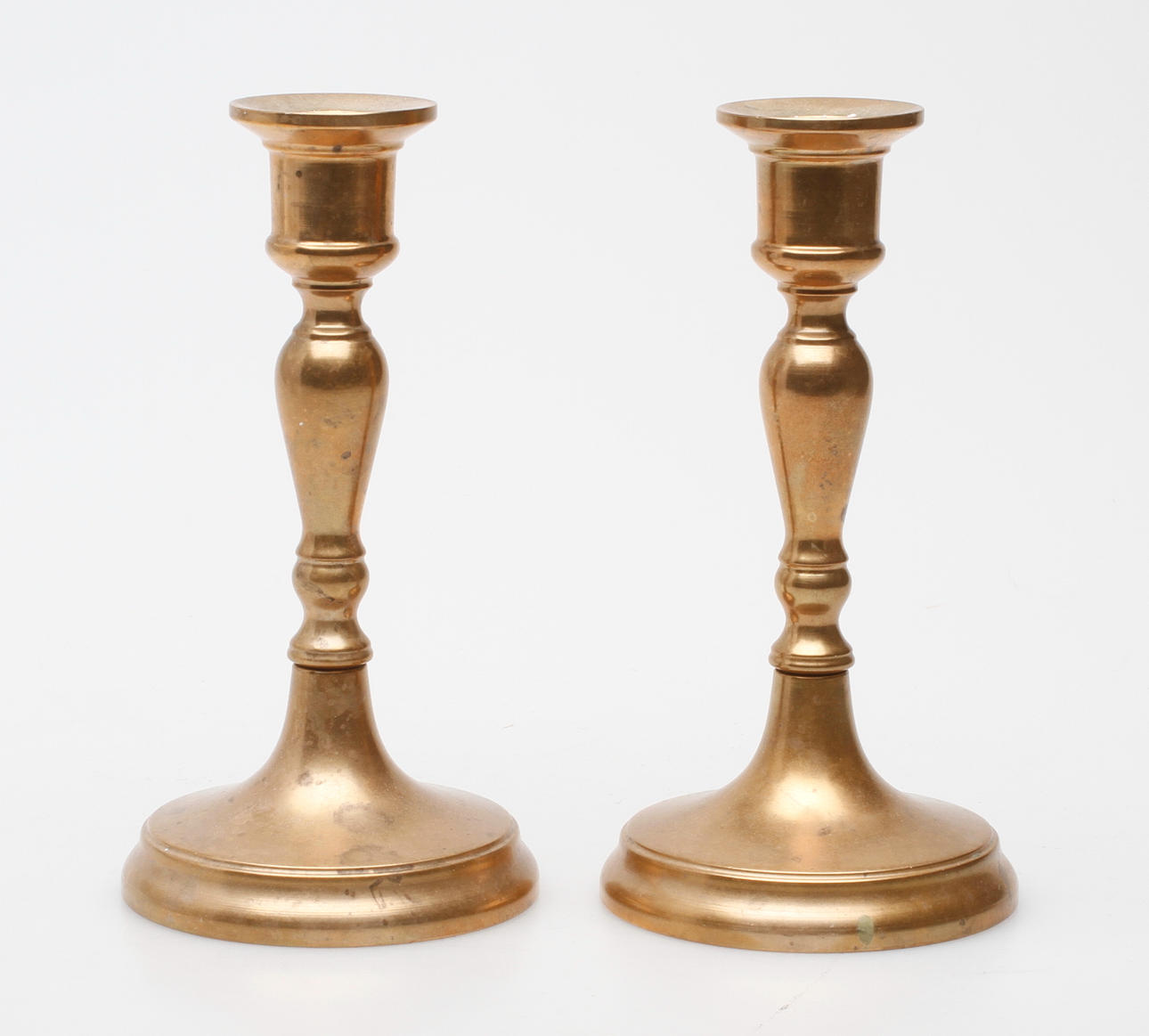 LJUSSTAKAR, ett par, malm, Bersbo 1984.