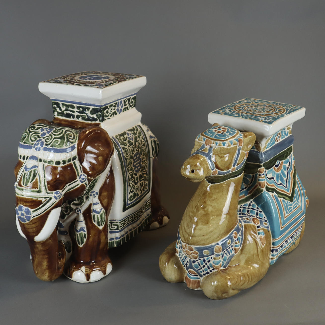 Two decorative figurative FLOWER STANDS / flower columns camel and elephant.