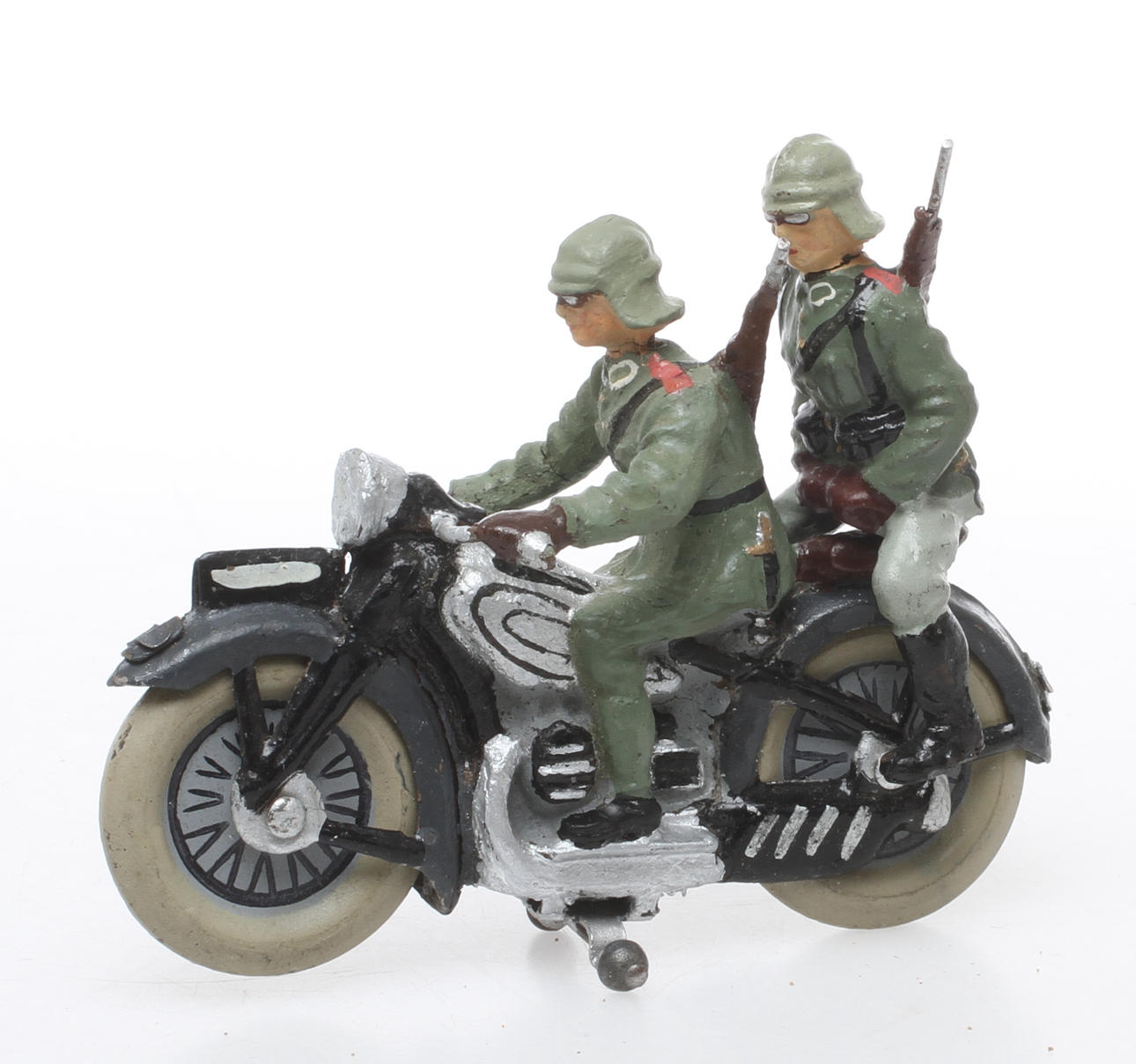 LINEOL MOTORCYKEL med passagerare.