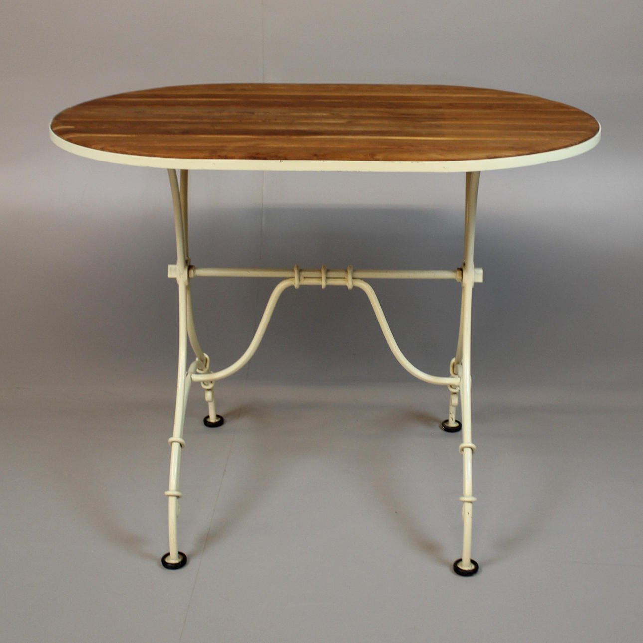 TABLE metal base with wooden slats.