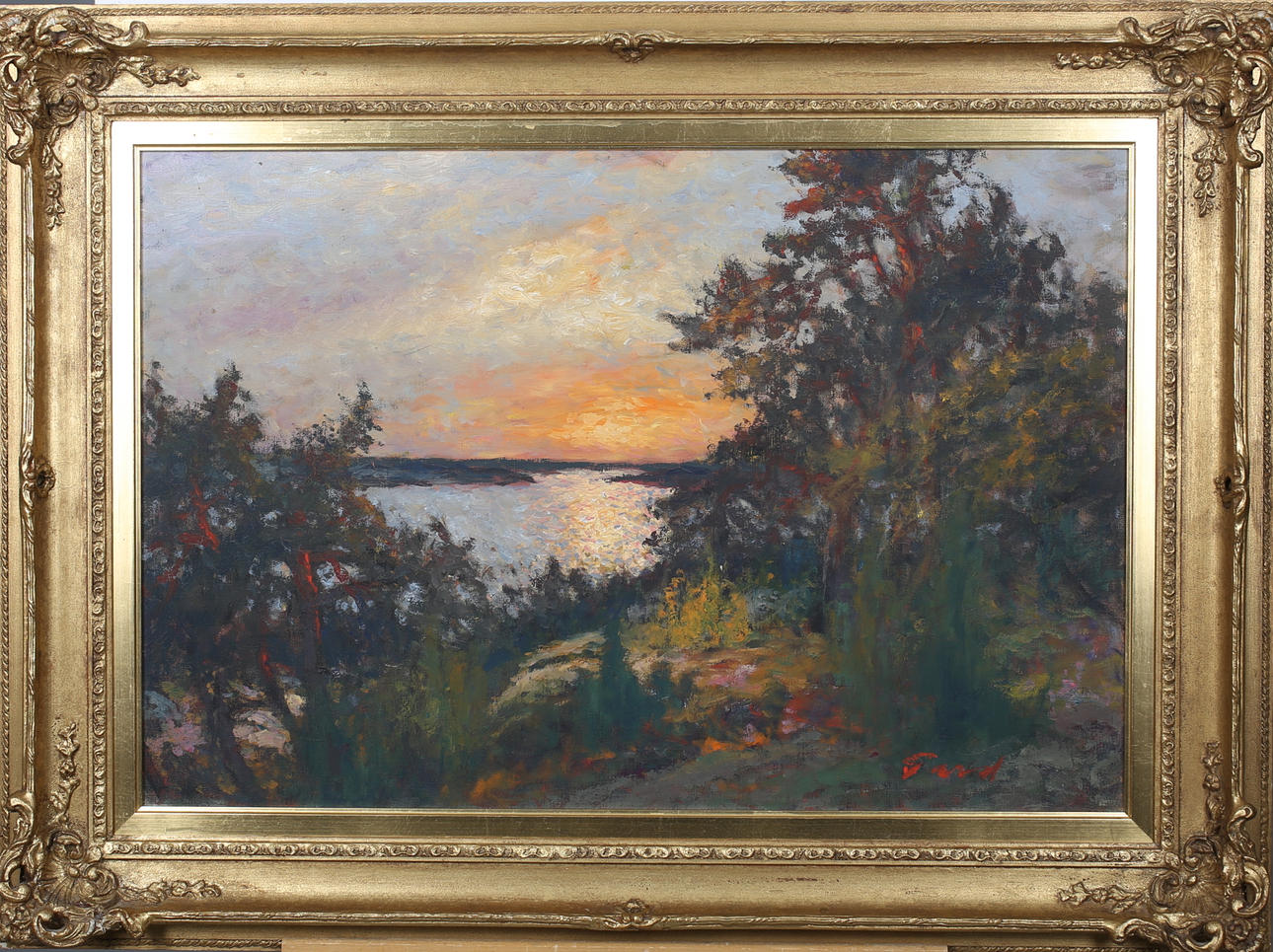 FRANS GARD. Sjölandskap i solnedgång. Olja på duk. Signerad Gard.