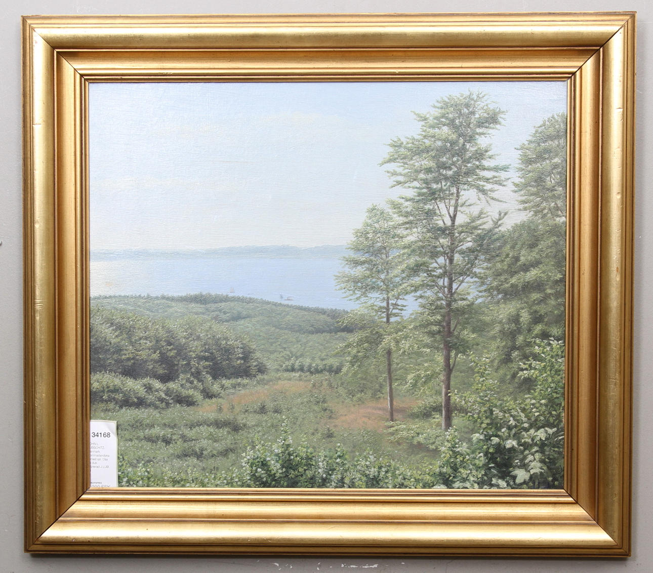 JOHN L LÜBSCHITZ. Danmark. Sommarlandskap med sjö. Olja på duk. Signerad J.LÜB.