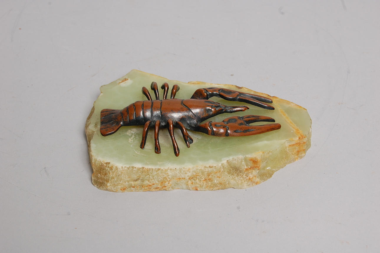 BREVPRESS, brons, i form av kräfta.