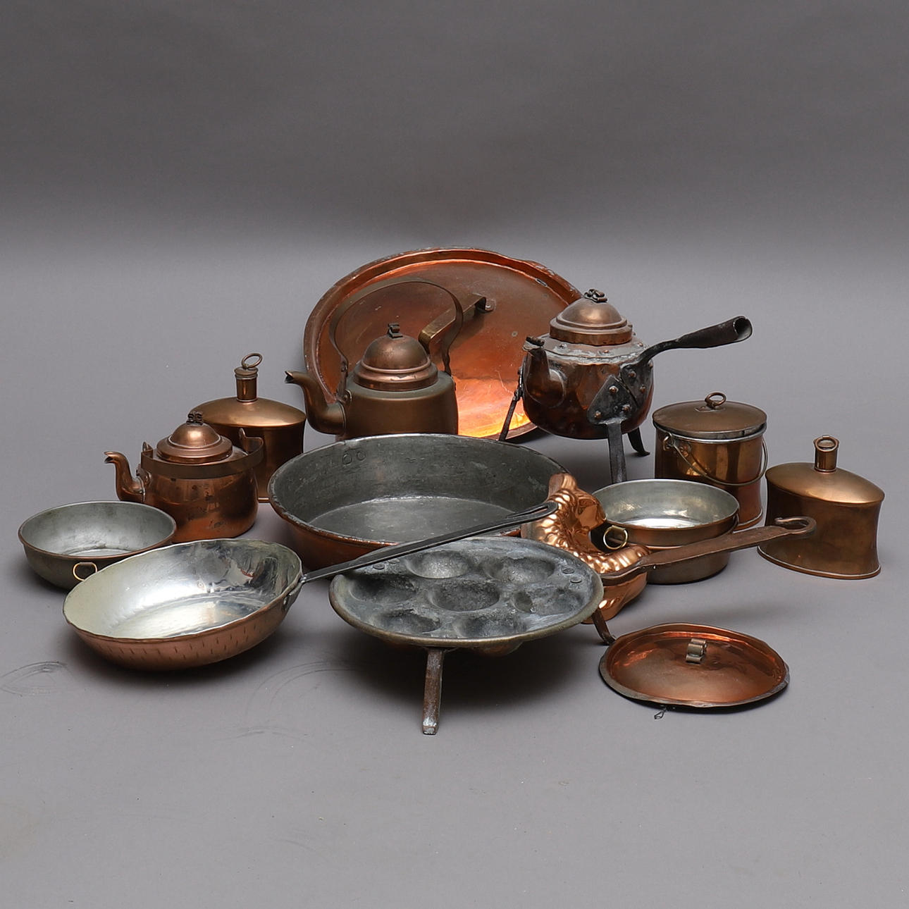 COPPER OBJECTS, 15 parts, including donut cores, coffee pots, 18th-19th ...